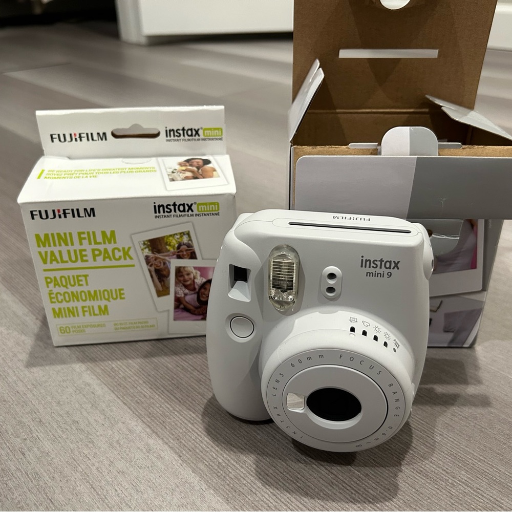 Fiji instax mini 9 camera with 5 pack of unused film, album included… all new.